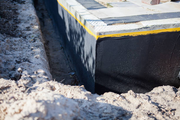 Professional Exterior Waterproofing technician working in Augusta, KS